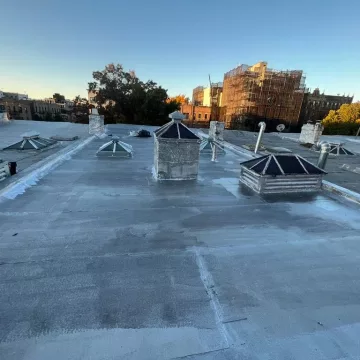 evening view of the roof to be repaired